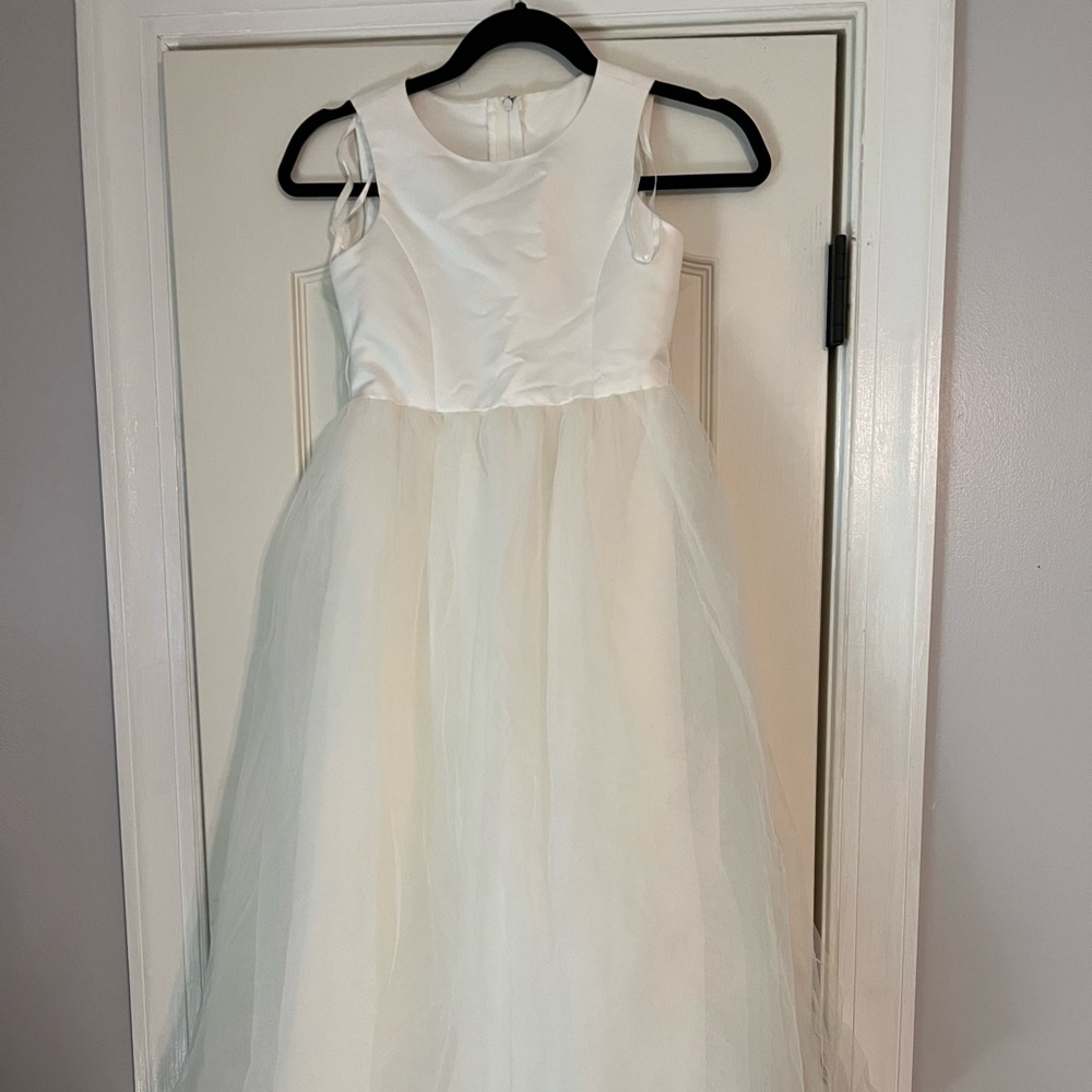 New kids David’s bridal dress, belt and silver tiara.